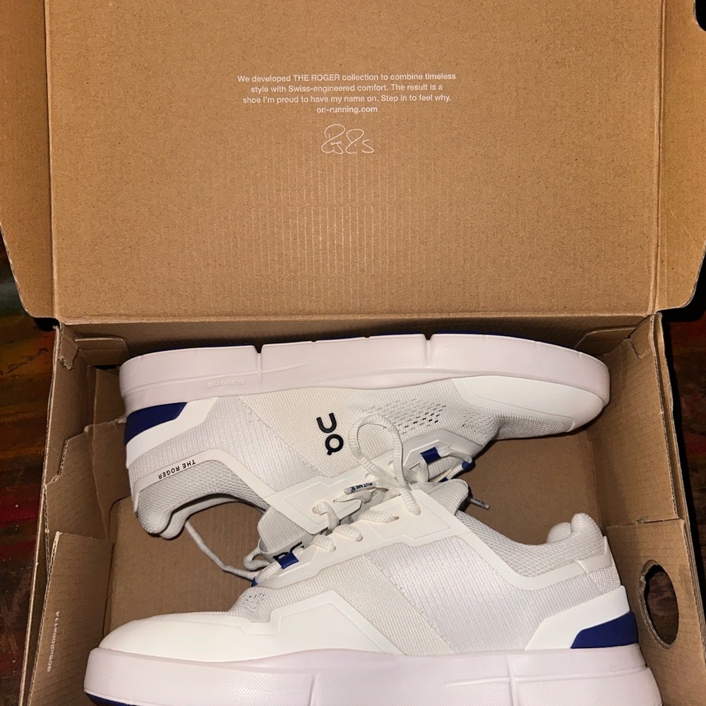 On Running White and Blue Sneakers